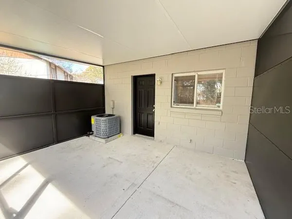 a bedroom with a bed and a cabinets