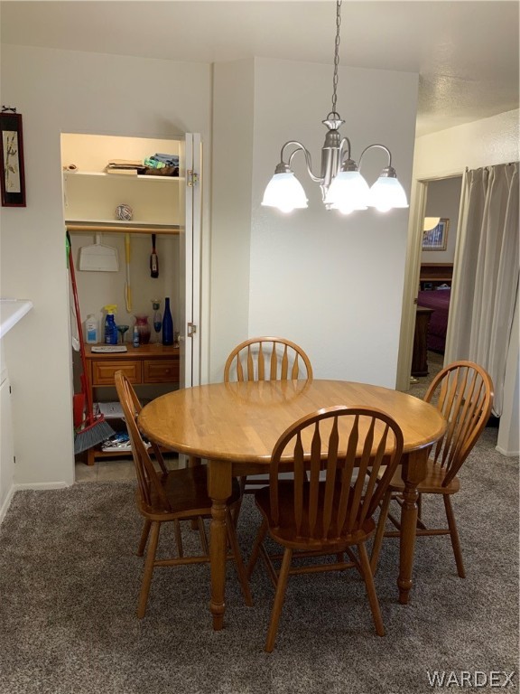 2052 Mesquite Lane, Unit 101 Laughlin, NV 89029 - Photo 12 of 32 a view of a dining room with furniture