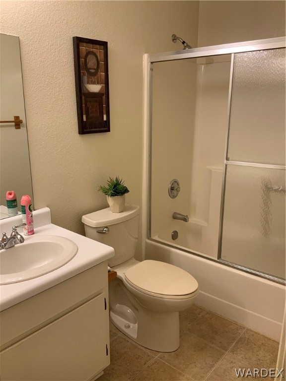 2052 Mesquite Lane, Unit 101 Laughlin, NV 89029 - Photo 28 of 32 a bathroom with a sink toilet and shower