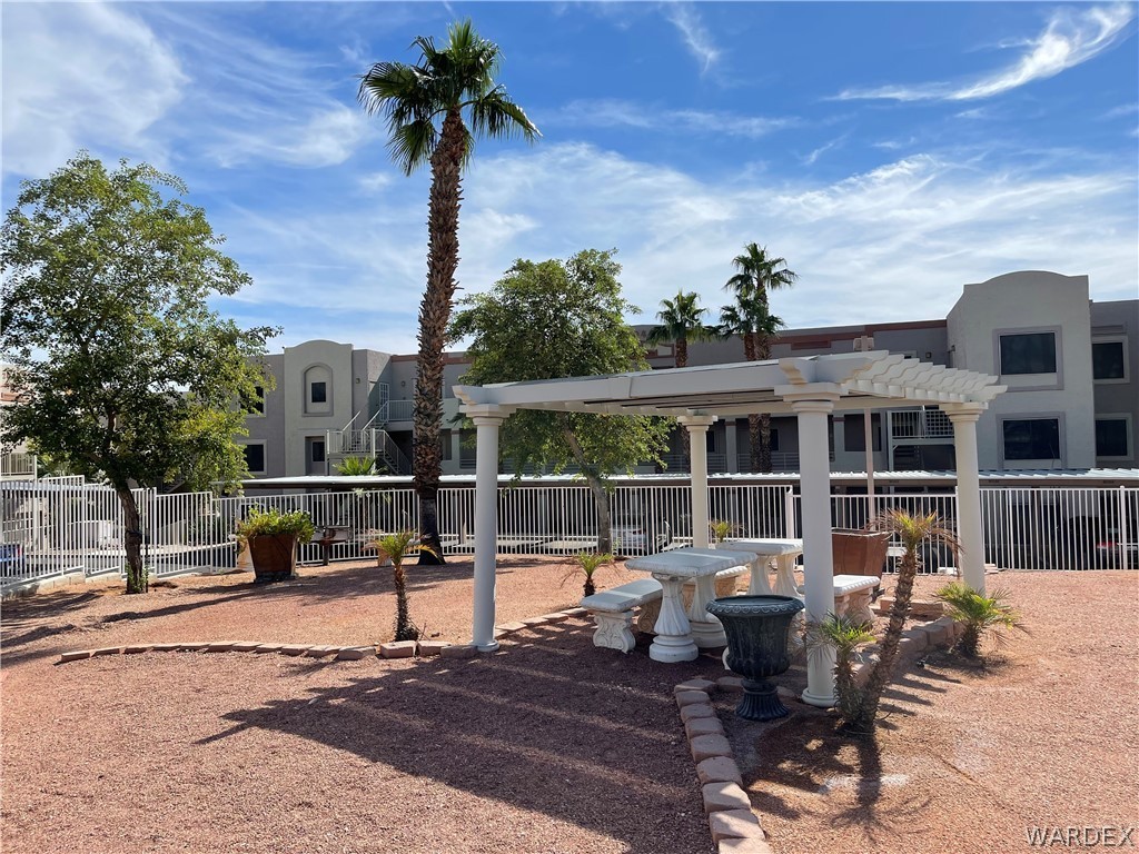 2052 Mesquite Lane, Unit 101 Laughlin, NV 89029 - Photo 32 of 32 a front view of a building with outdoor seating