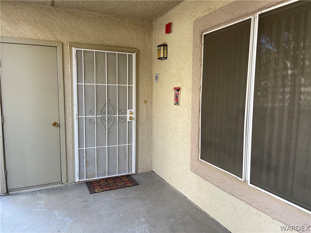 2052 Mesquite Lane, Unit 101 Laughlin, NV 89029 - Photo 4 of 32 an empty room with windows
