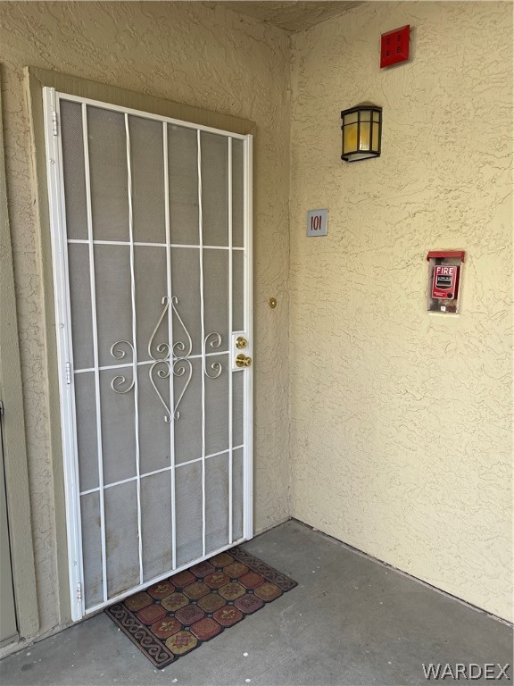 2052 Mesquite Lane, Unit 101 Laughlin, NV 89029 - Photo 5 of 32 a view of an empty room with wooden floor