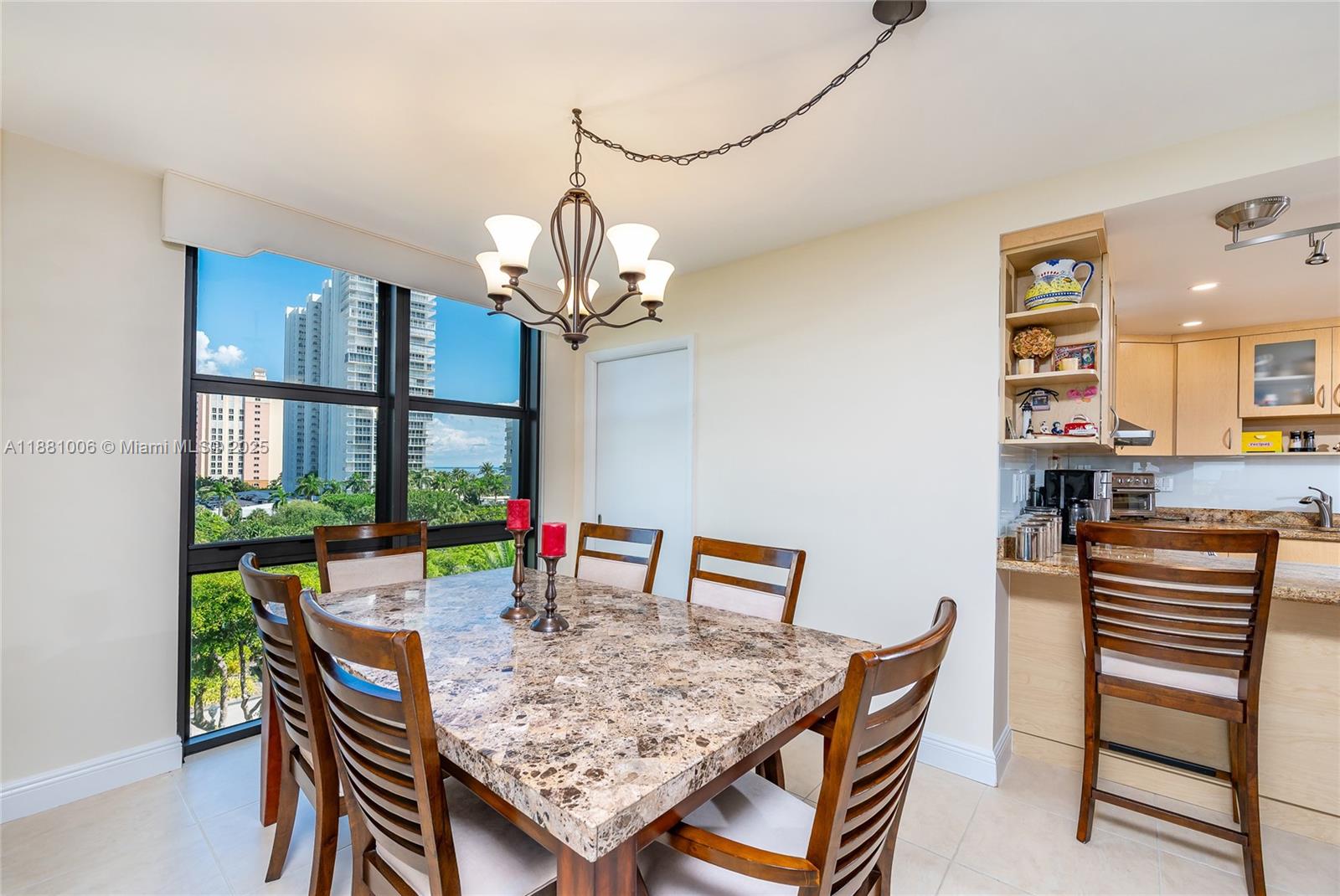 1121 Crandon Boulevard, Unit E501 Key Biscayne, FL 33149 - Photo 11 of 44 a view of a dining room with furniture window and wooden floor