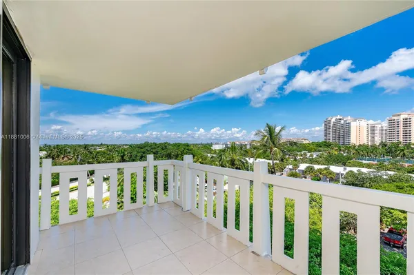 a view of a balcony with an outdoor space