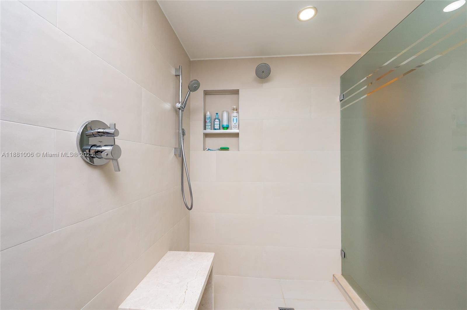 1121 Crandon Boulevard, Unit E501 Key Biscayne, FL 33149 - Photo 24 of 44 a bathroom with a shower