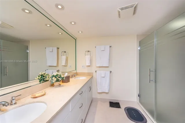 a view of a swimming pool with a yard and sitting area