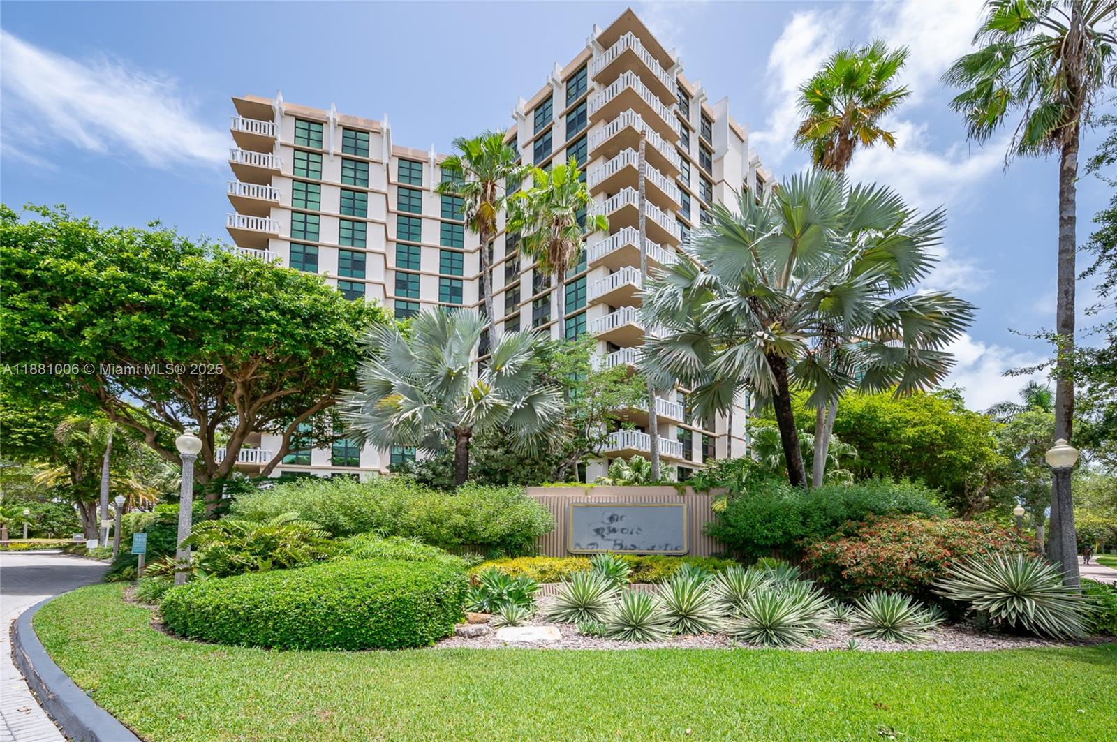 1121 Crandon Boulevard, Unit E501 Key Biscayne, FL 33149 - Photo 38 of 44 a front view of a house with a yard