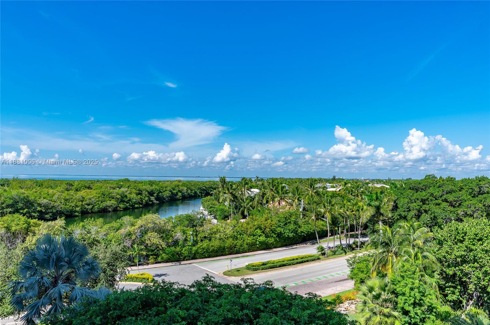 1121 Crandon Boulevard, Unit E501 Key Biscayne, FL 33149 - Photo 41 of 44 a view of a swimming pool with an outdoor space and seating area