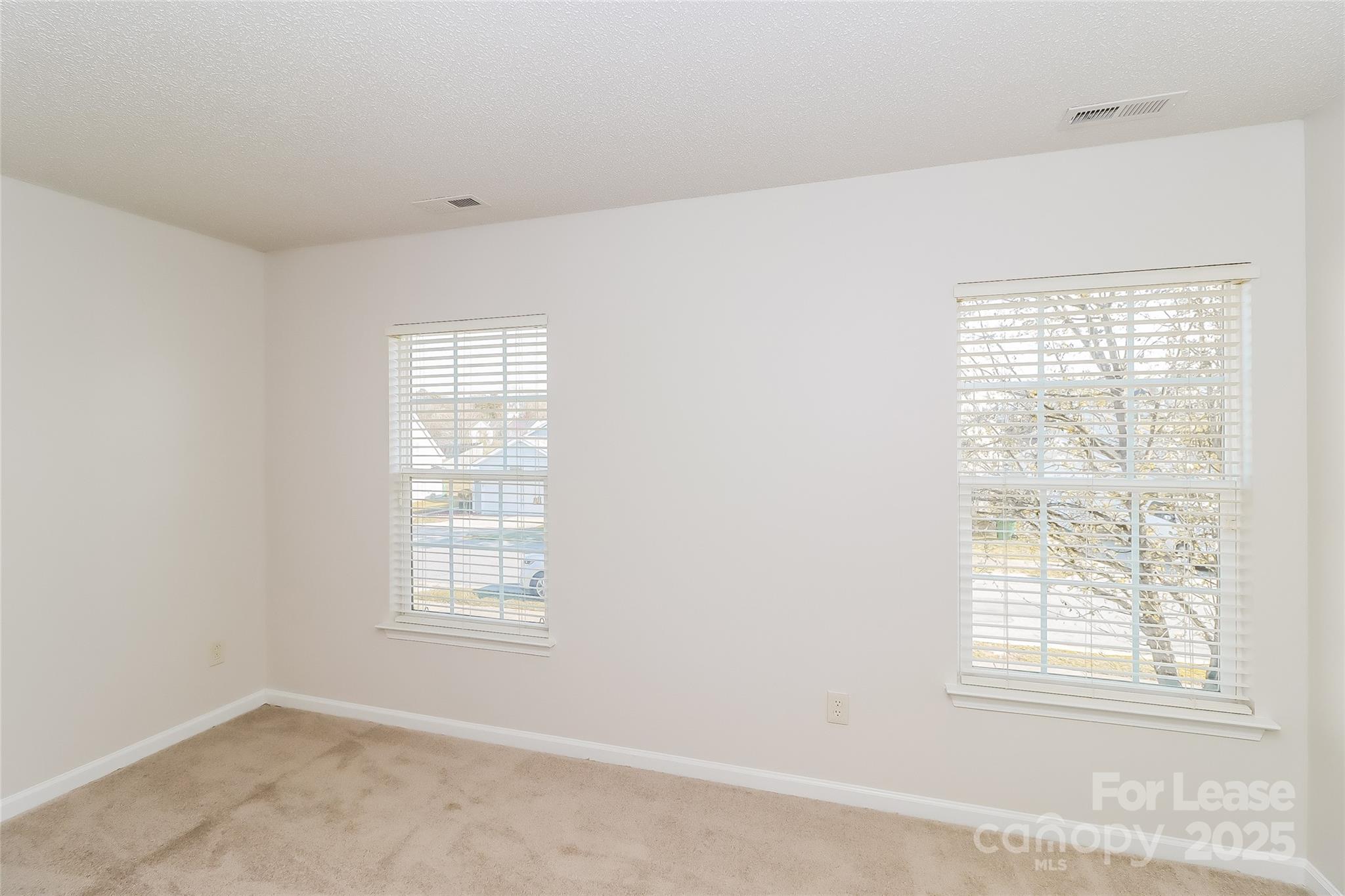 2032 Pimpernel Road Charlotte, NC 28213 - Photo 5 of 17 a view of an empty room with a window