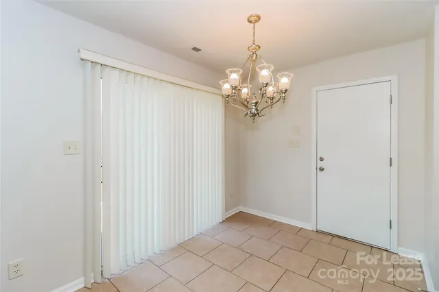 a view of a chandelier in a room