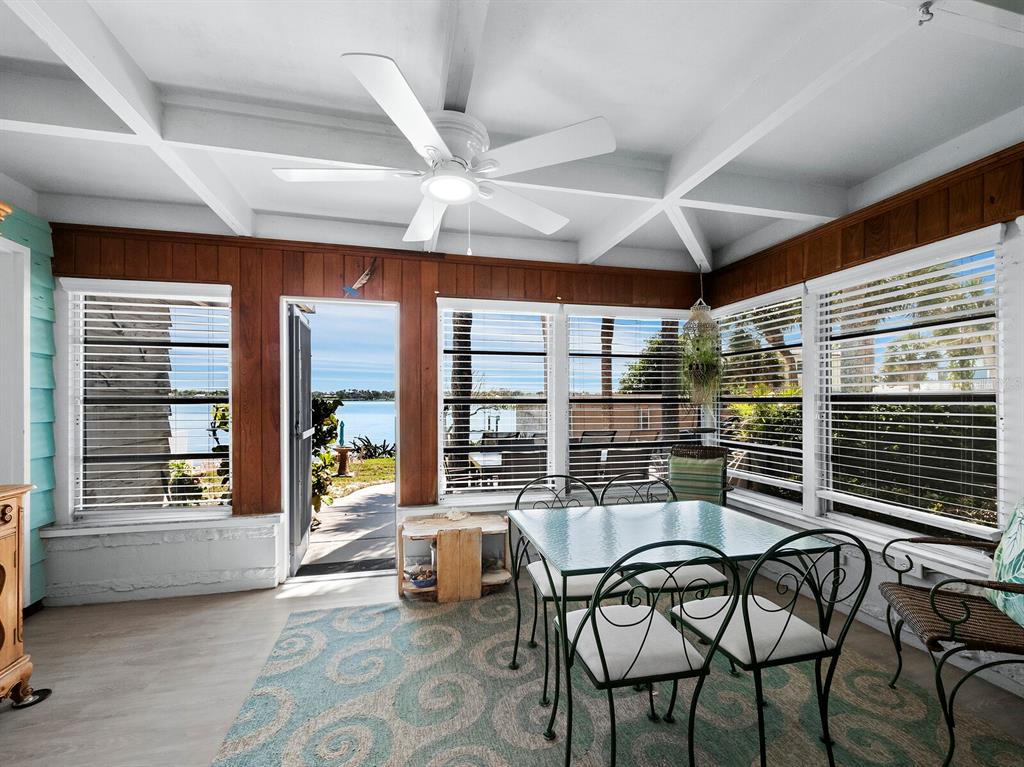 1620 Casey Key Road Nokomis, FL 34275 - Photo 14 of 49 a living room with furniture and a window