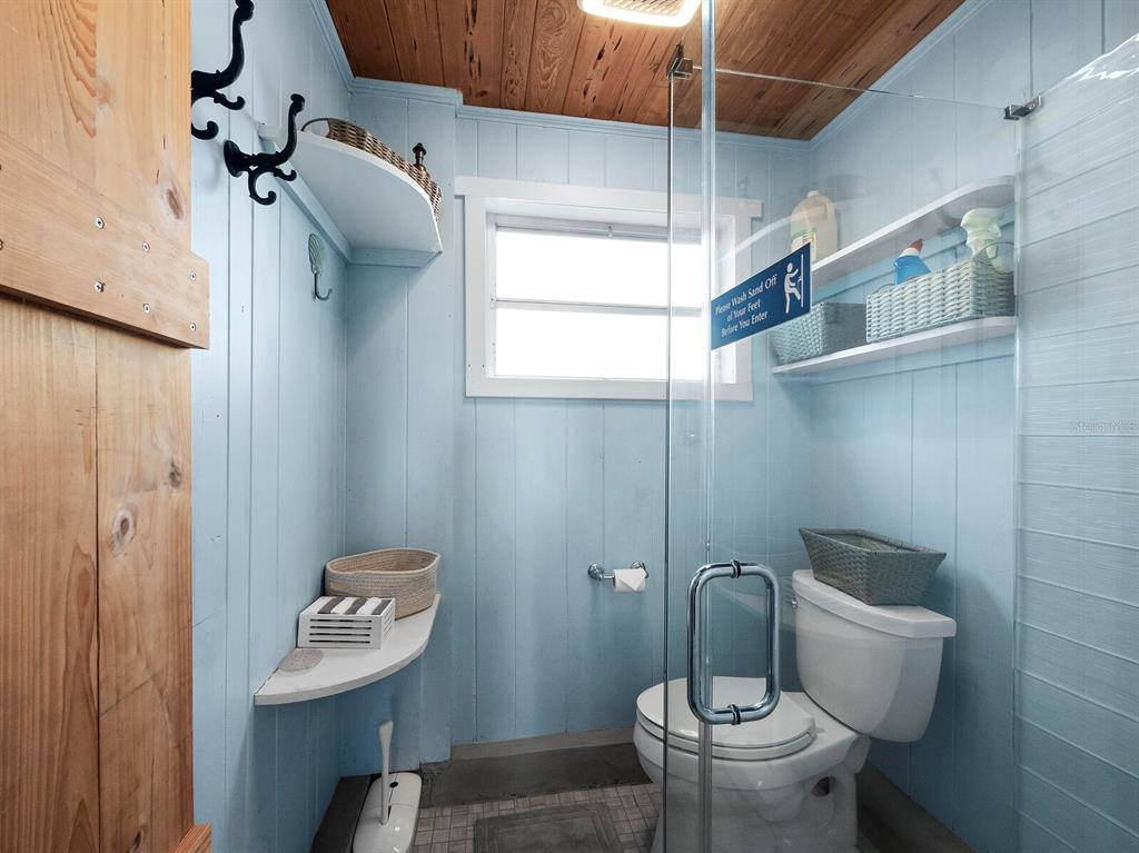 1620 Casey Key Road Nokomis, FL 34275 - Photo 31 of 49 a bathroom with a toilet and a shower