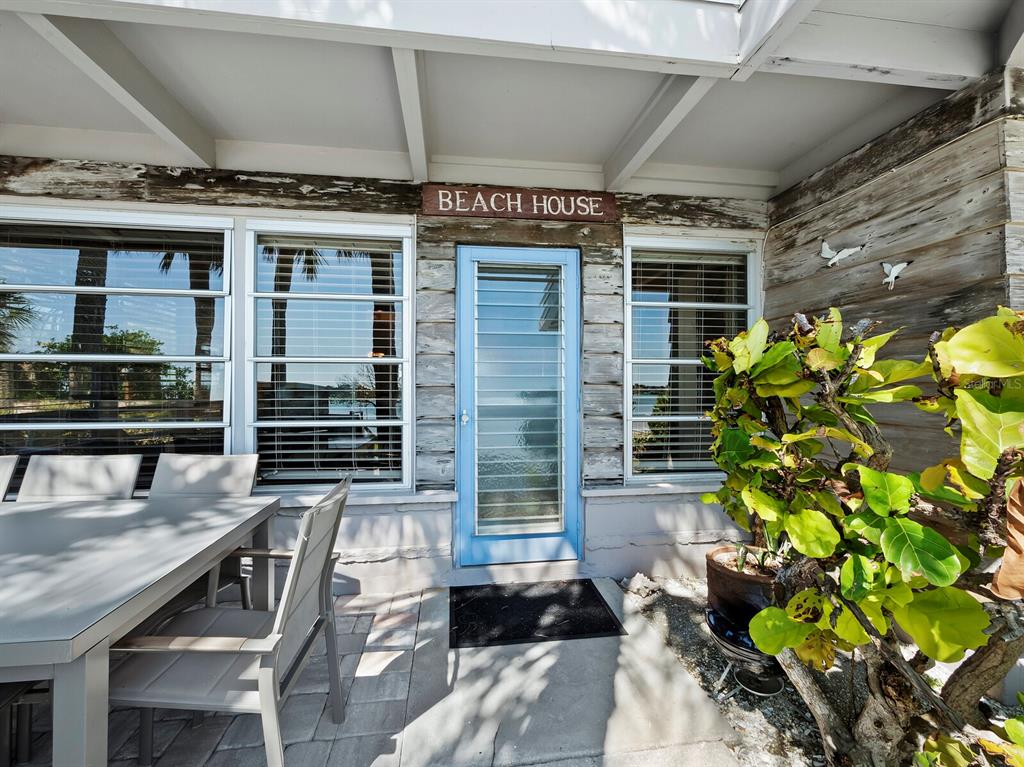 1620 Casey Key Road Nokomis, FL 34275 - Photo 34 of 49 a front view of a house with a yard