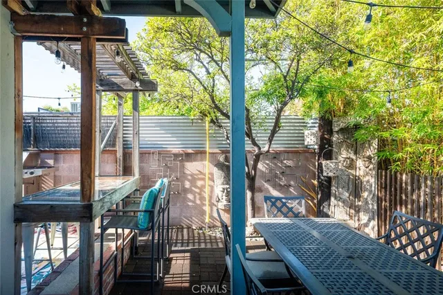a view of balcony with wooden floor