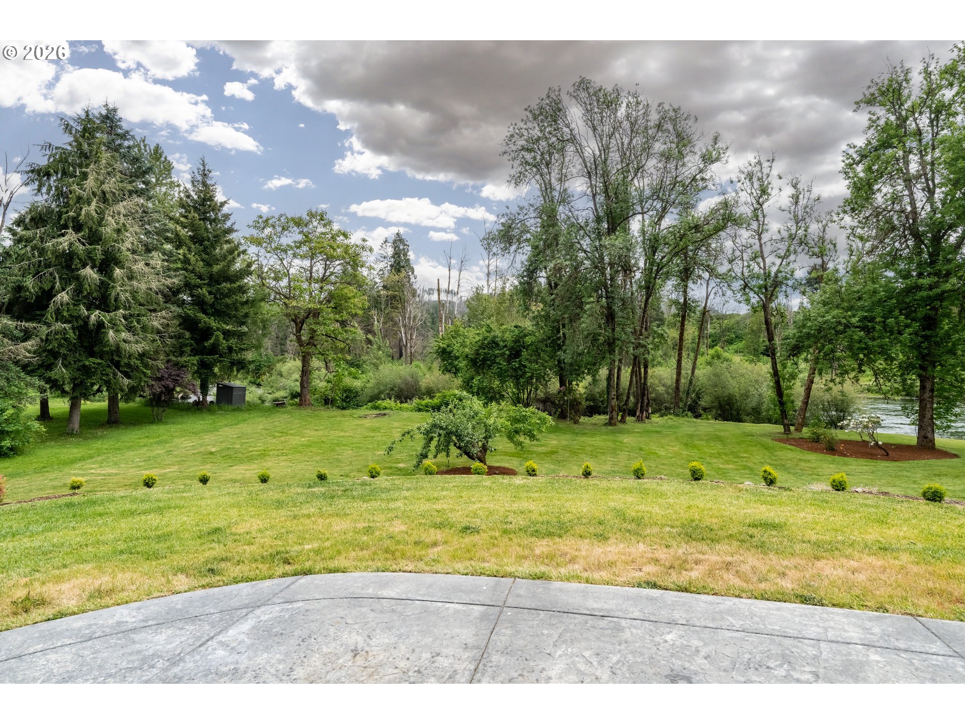 45542 South Gate Creek Road Vida, OR 97488 - Photo 43 of 46 a view of a golf course with a house
