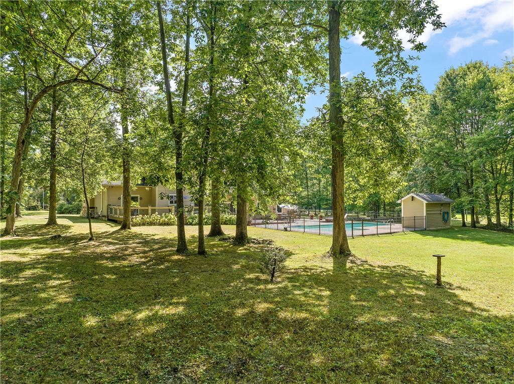 49 Babcock Road Mercer, PA 16137 - Photo 49 of 49 a swimming pool with trees in the background