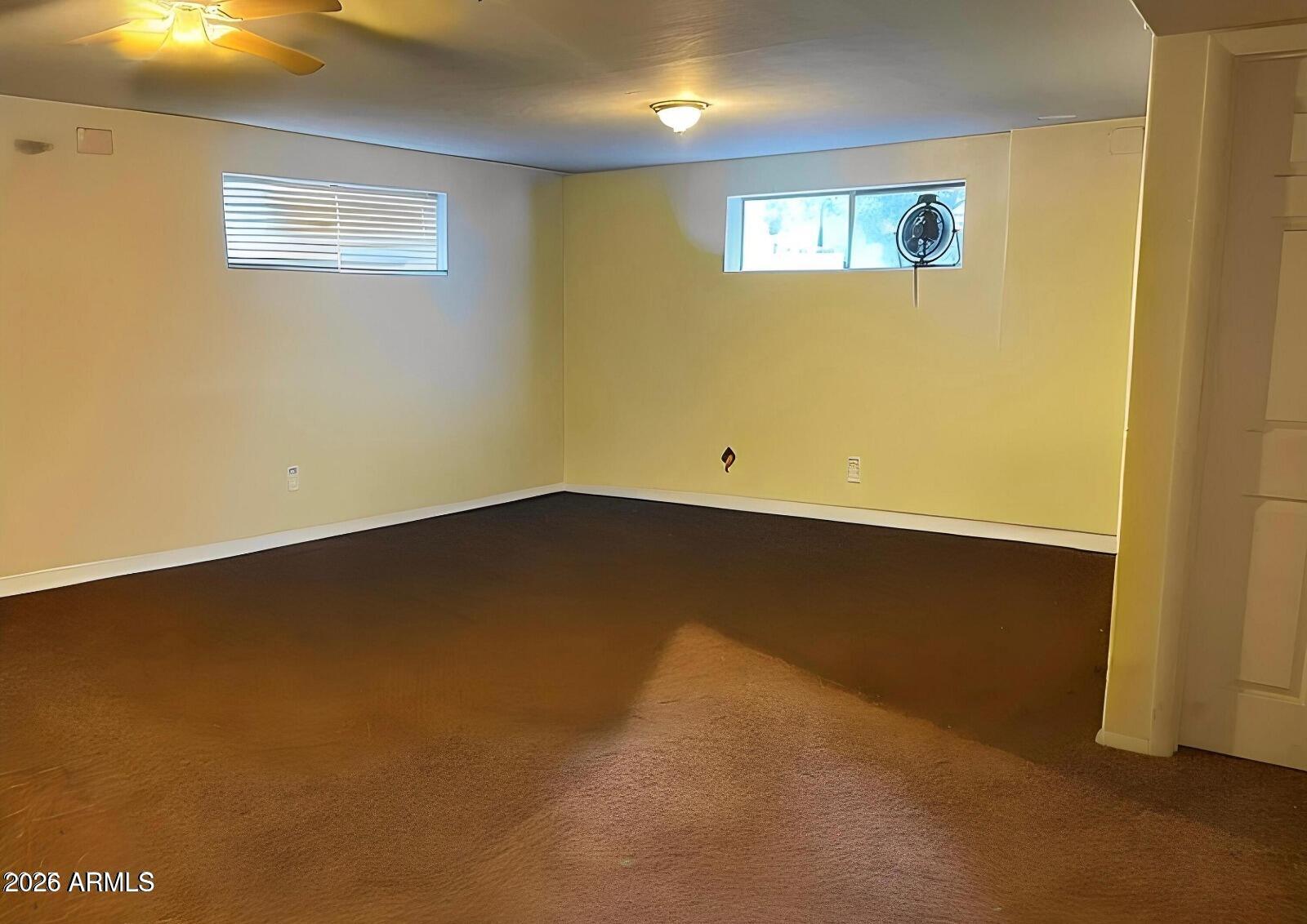 2870 Mustang Trail Overgaard, AZ 85933 - Photo 13 of 17 an empty room with a door