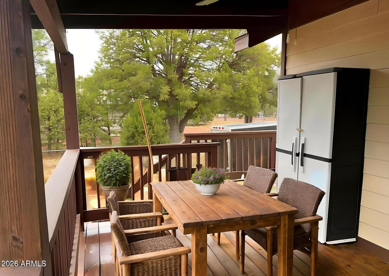 2870 Mustang Trail Overgaard, AZ 85933 - Photo 14 of 17 a view of a balcony dining area