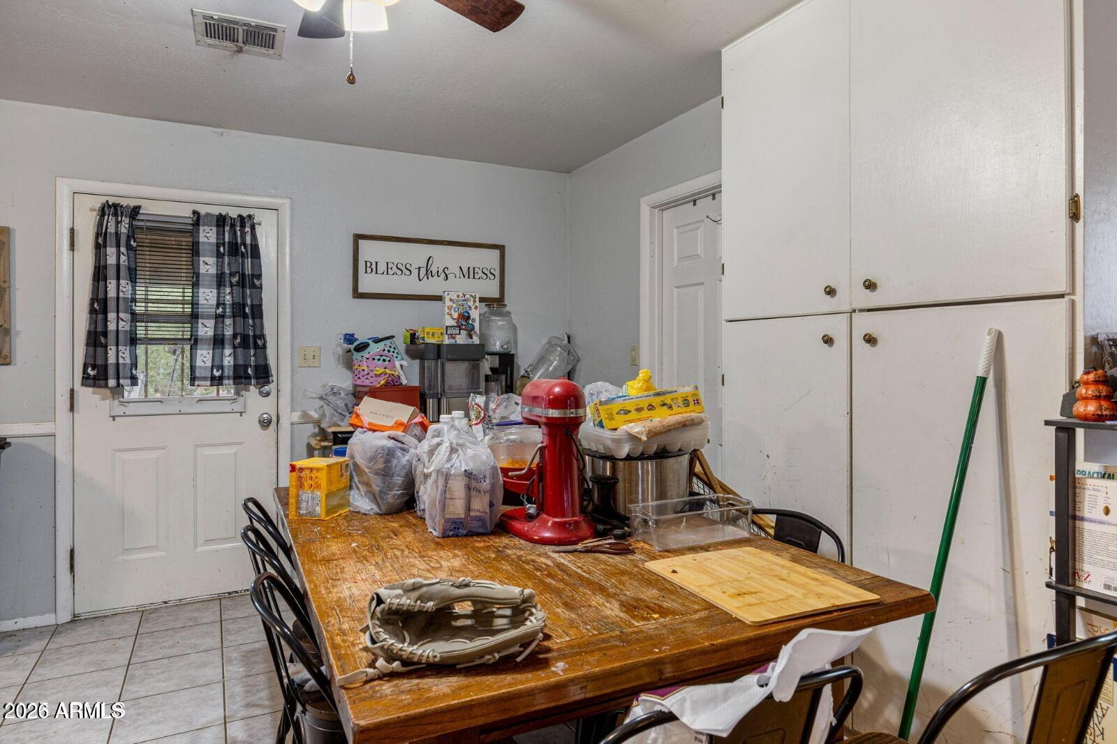 2870 Mustang Trail Overgaard, AZ 85933 - Photo 7 of 17 a view of a dining room with furniture window and wooden floor