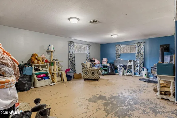 a view of a room with lots of storage and bicycles