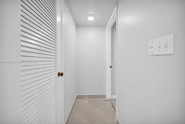 a bathroom with sinks a vanity and a large mirror