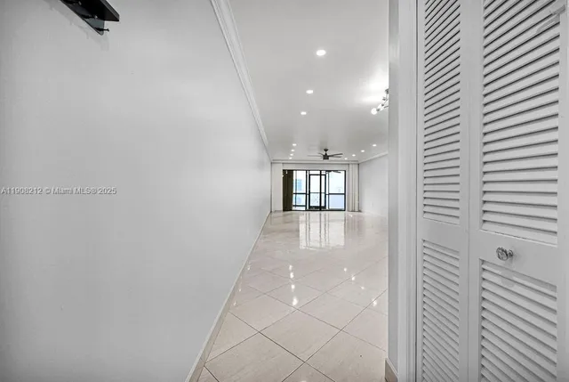 a living room with furniture and natural light
