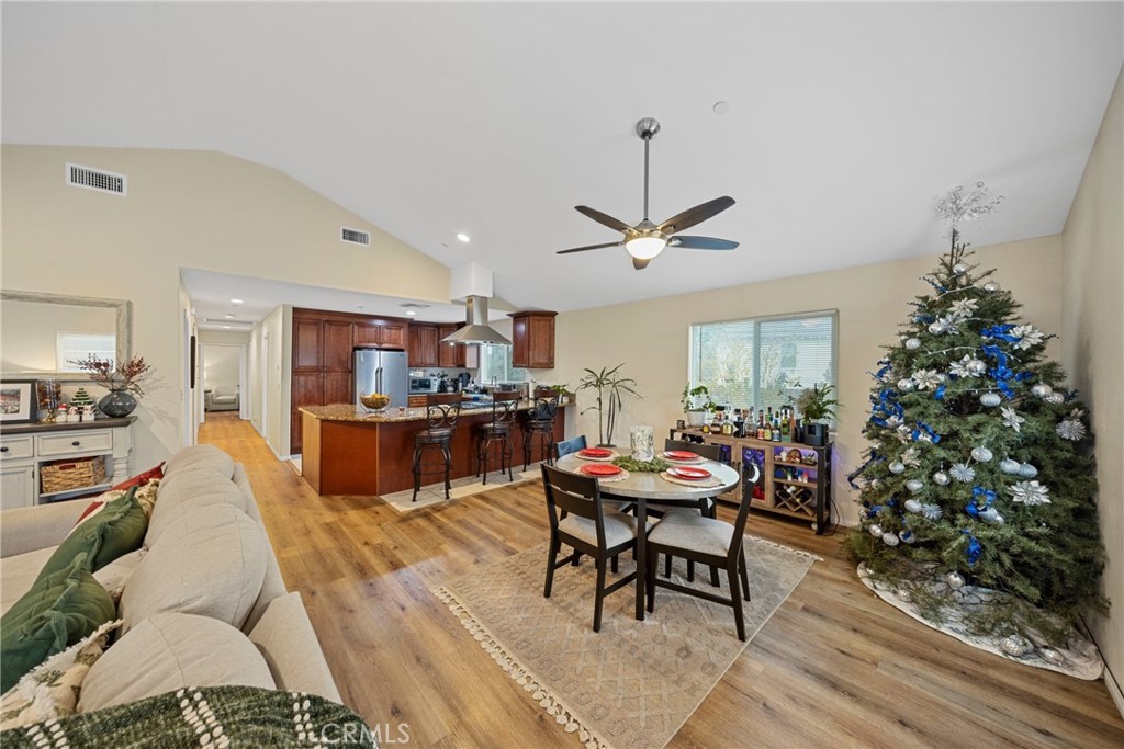 65 Tennessee Street Redlands, CA 92373 - Photo 12 of 23 a living room with furniture kitchen view and a potted plant