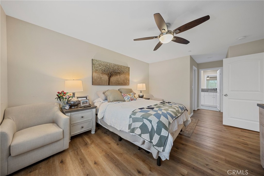 65 Tennessee Street Redlands, CA 92373 - Photo 14 of 23 a bedroom with bed couch and window