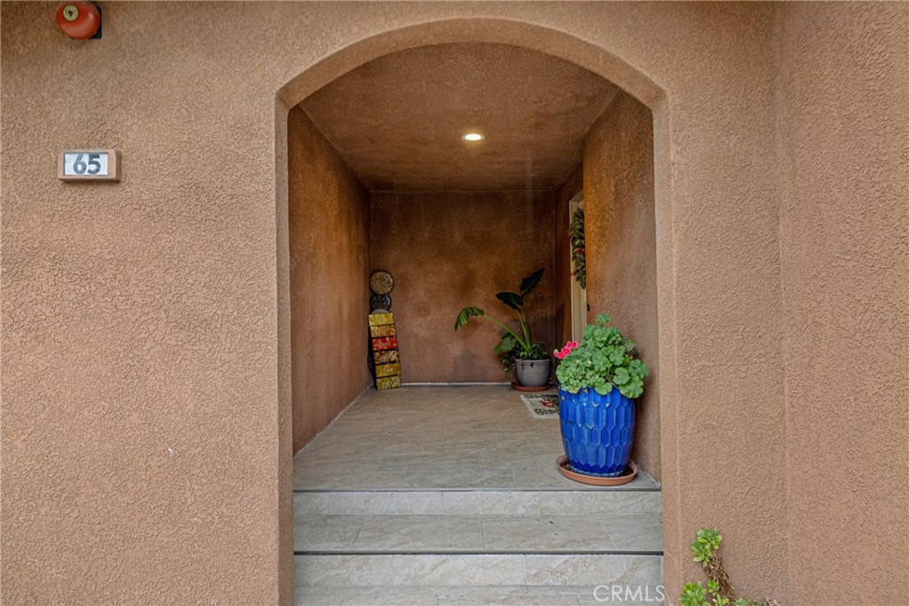 65 Tennessee Street Redlands, CA 92373 - Photo 20 of 23 a view of a hallway with a flower pot