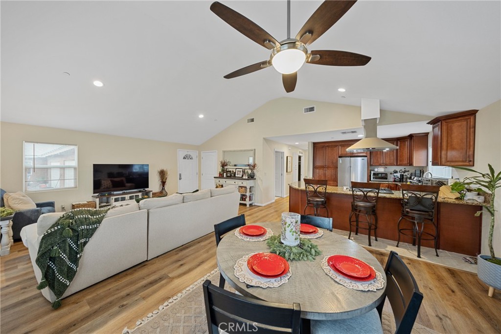 65 Tennessee Street Redlands, CA 92373 - Photo 10 of 23 a living room with furniture and a flat screen tv