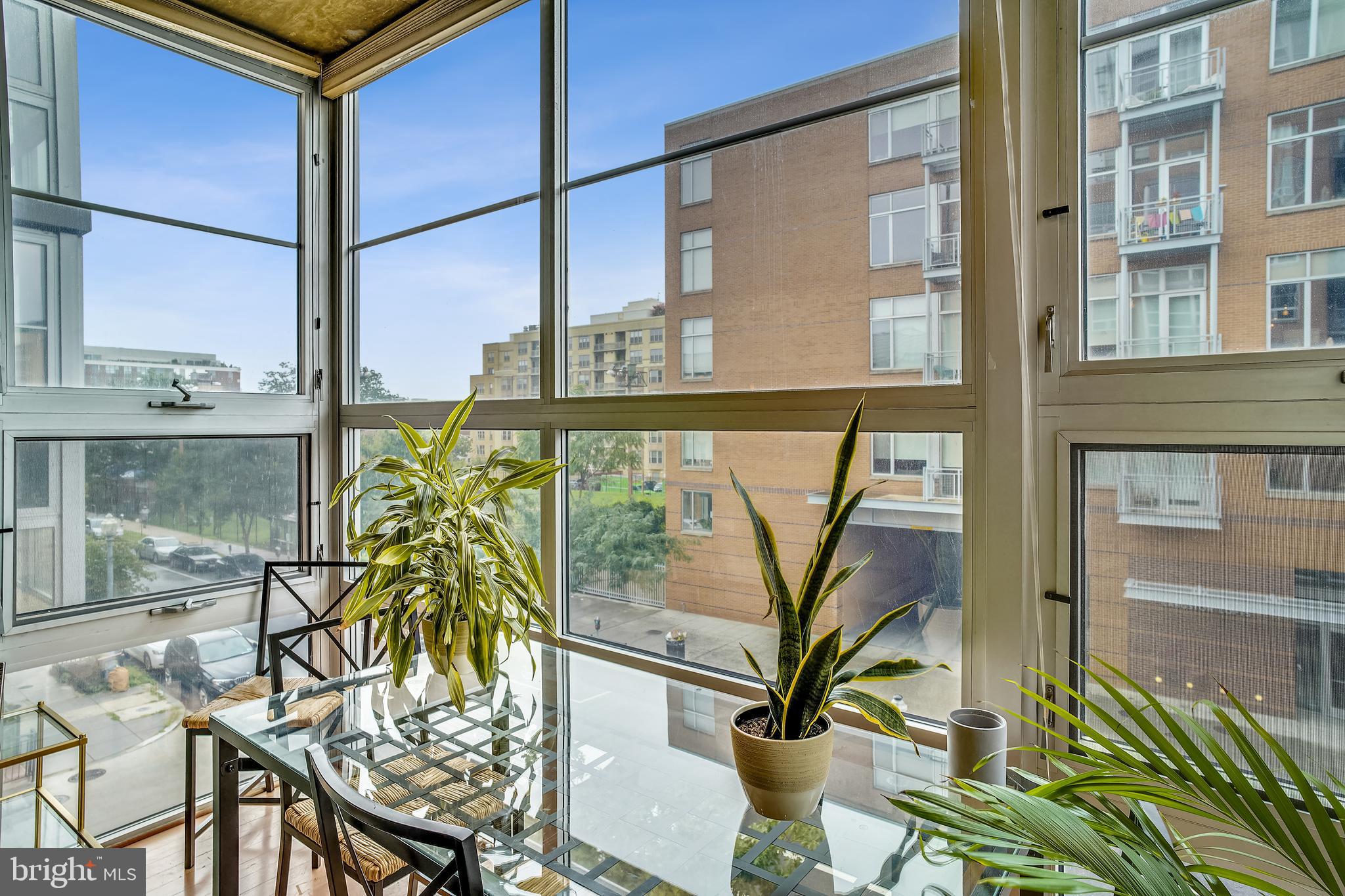 2125 14th Street Northwest, Unit 212 Washington, DC 20009 - Photo 6 of 21 a view of balcony with a potted plant