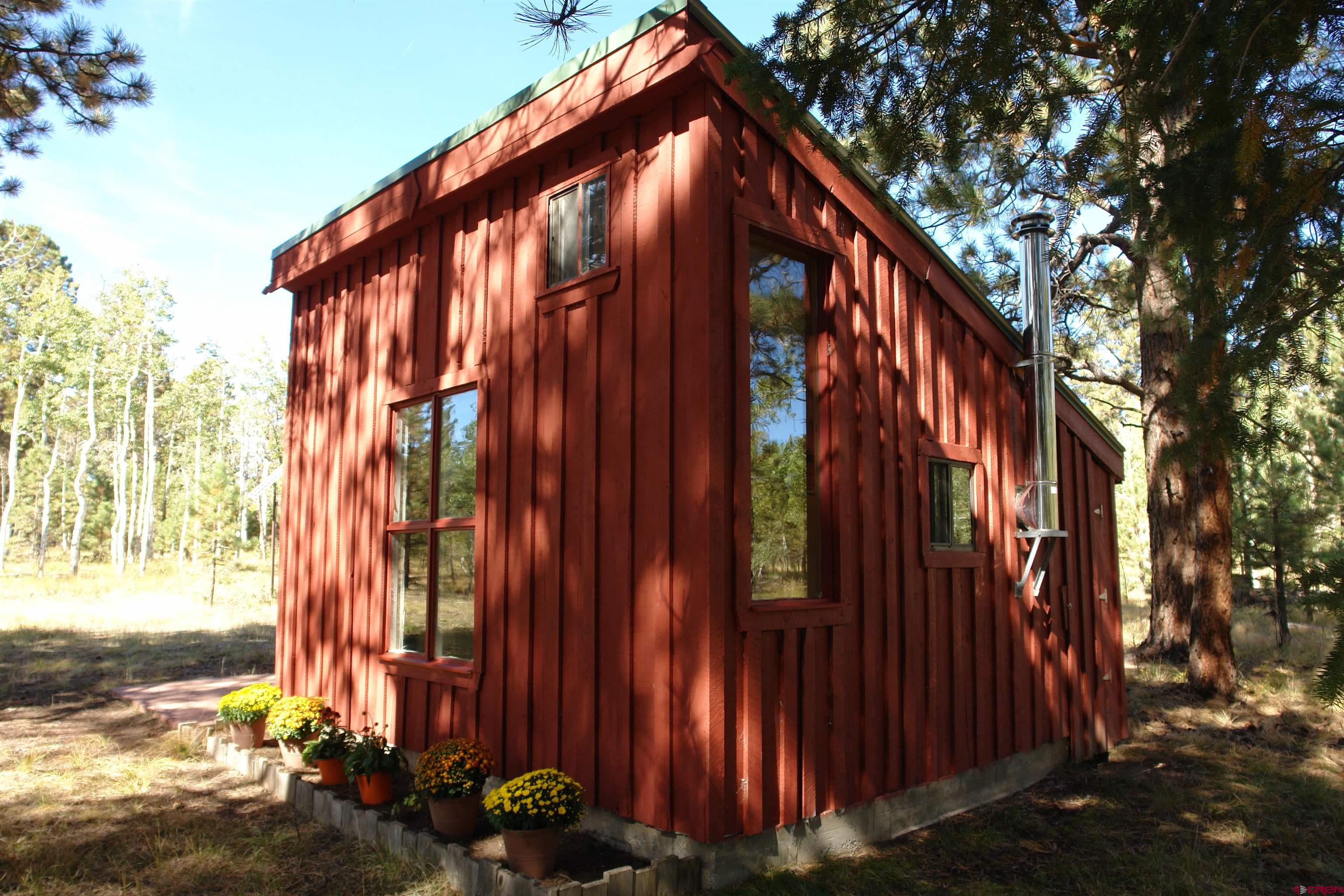 80 West Piney Woods Way Ridgway, CO 81432 - Photo 30 of 35 a front view of a building