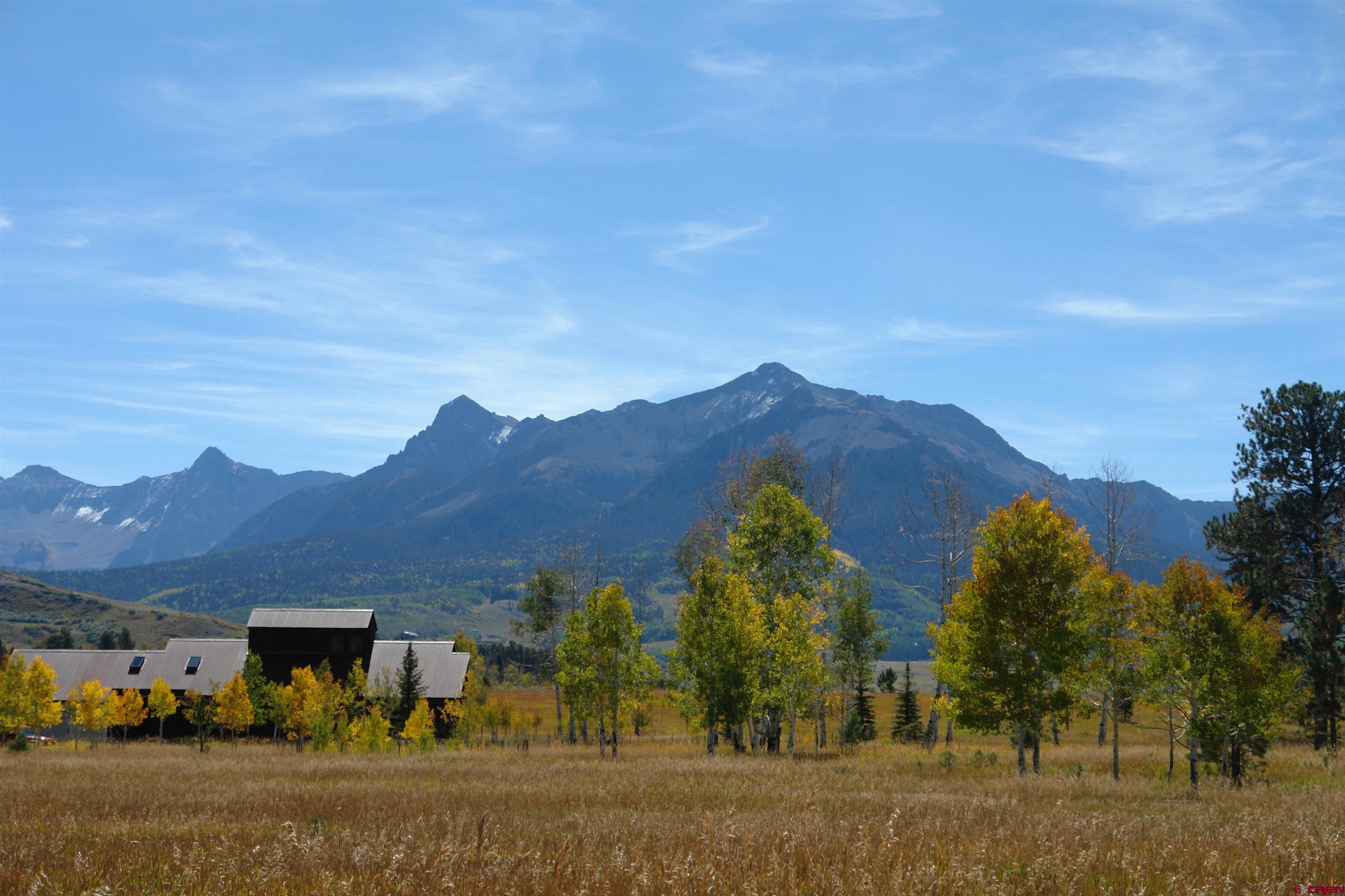 80 West Piney Woods Way Ridgway, CO 81432 - Photo 33 of 35 a view of a town with mountains in the background