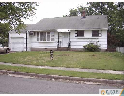 27 Sims Road Edison, NJ 08817 - Photo 1 of 9 a front view of a house with a yard