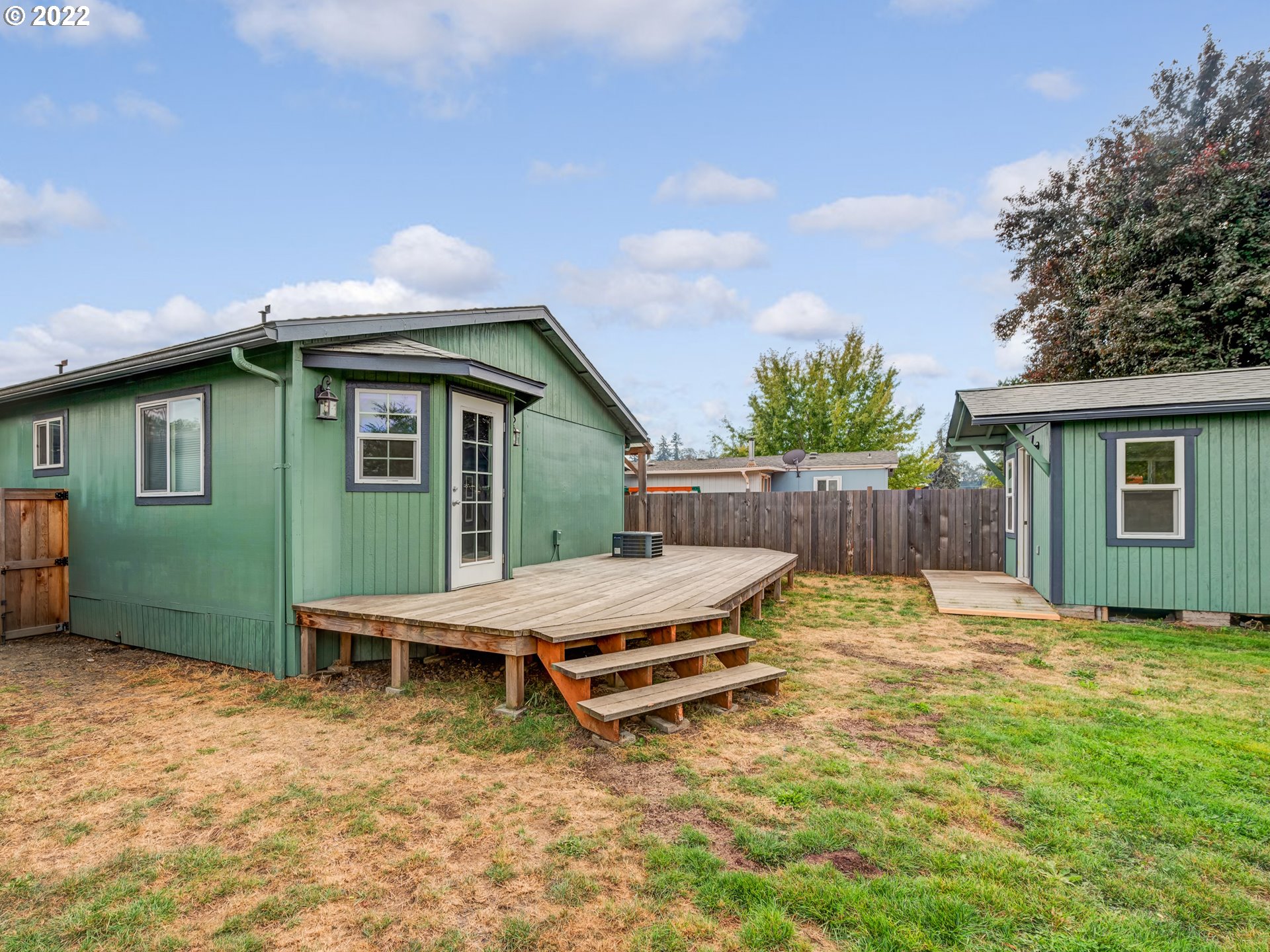 452 South 53rd Street Springfield, OR 97478 - Photo 21 of 26 a view of a house with backyard and sitting area