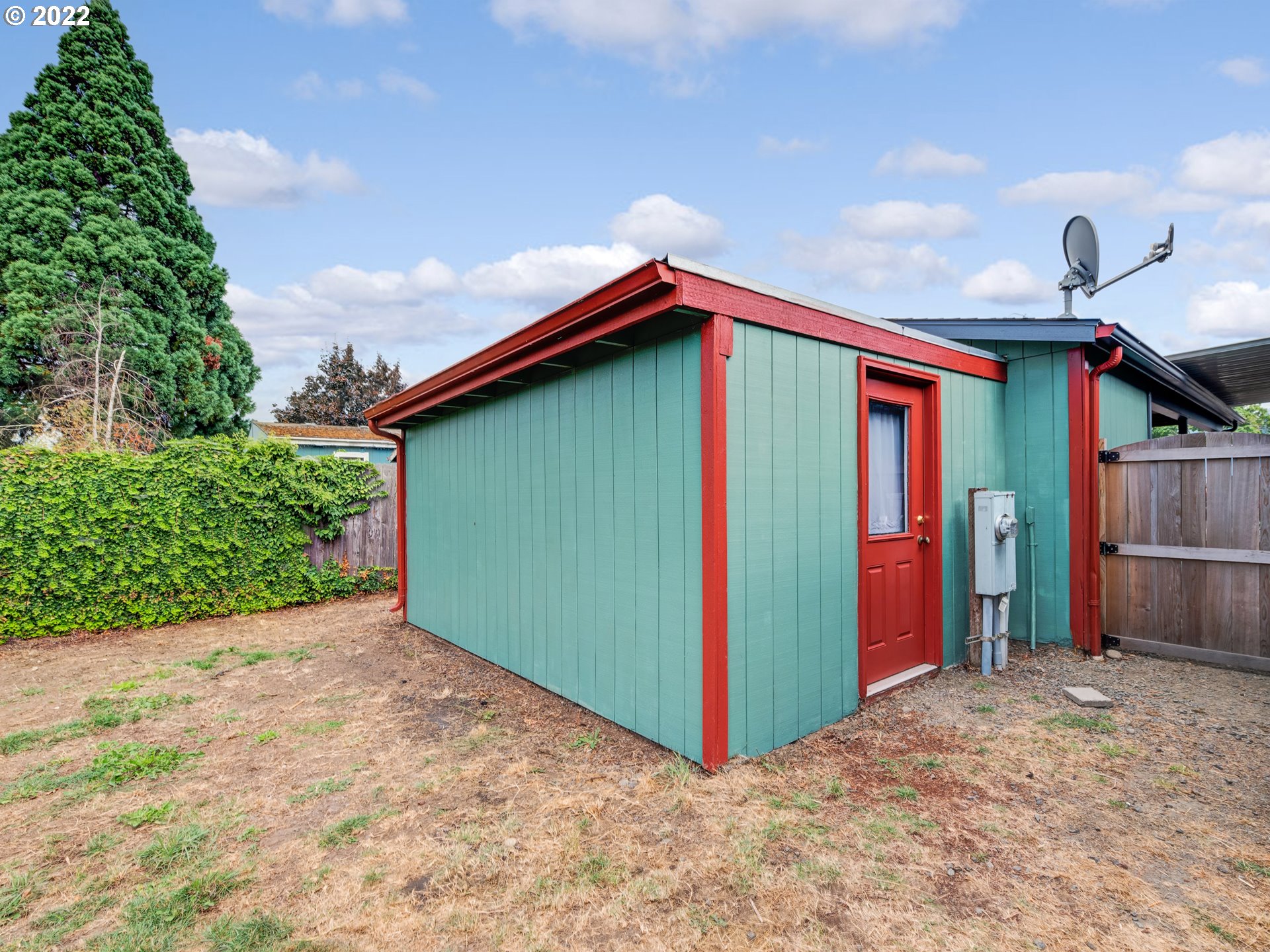452 South 53rd Street Springfield, OR 97478 - Photo 23 of 26 a view of a house with a yard and potted plants