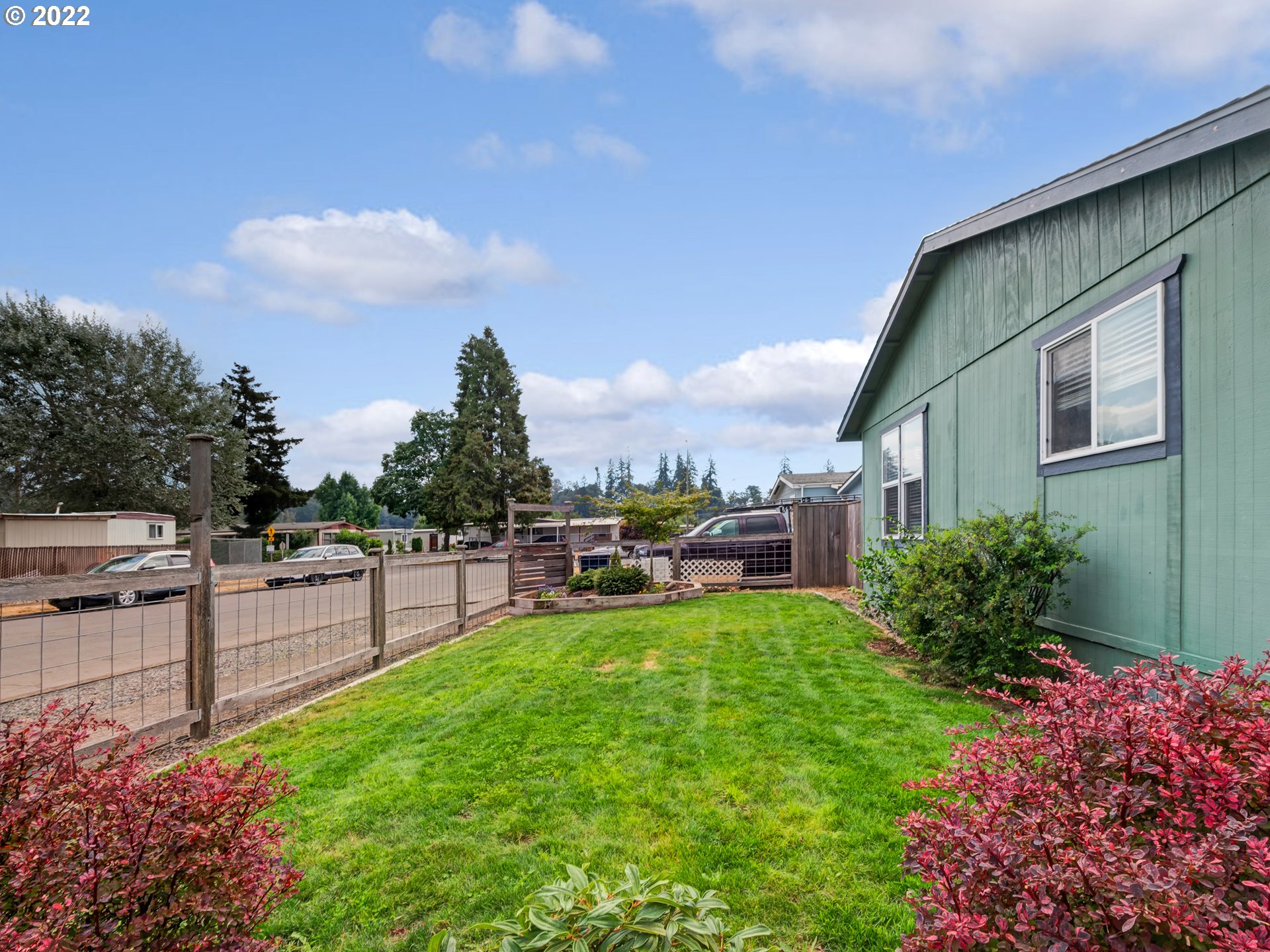 452 South 53rd Street Springfield, OR 97478 - Photo 3 of 26 a view of a backyard with sitting area
