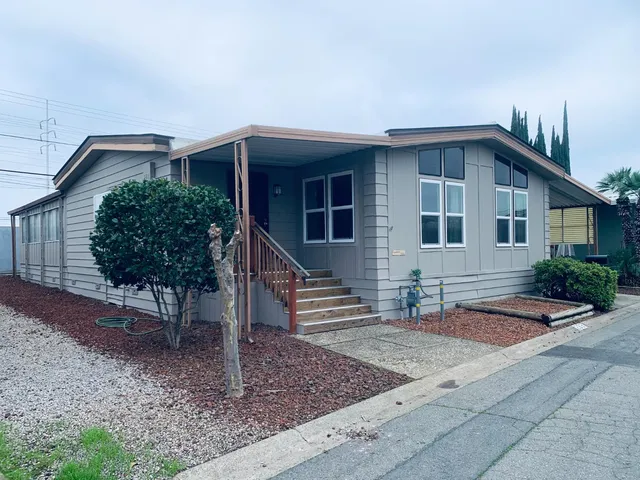 a front view of house with yard