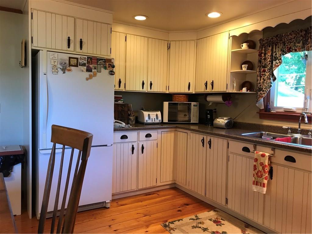 12 Company Road Hollis, ME 04042 - Photo 6 of 33 Updated kitchen has wide pine floors