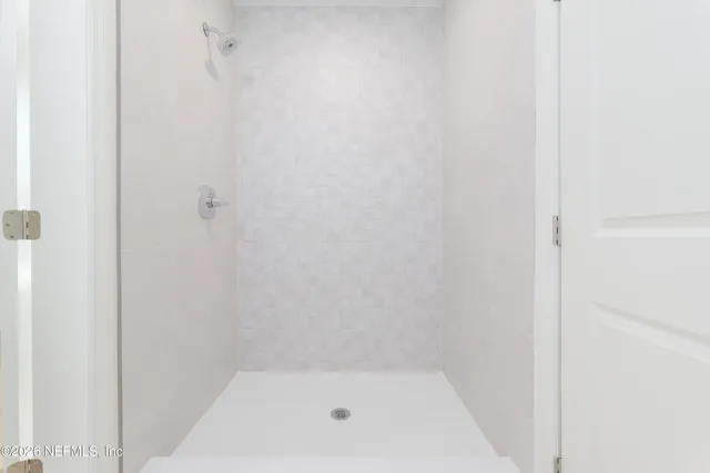 a bathroom with a bath tub