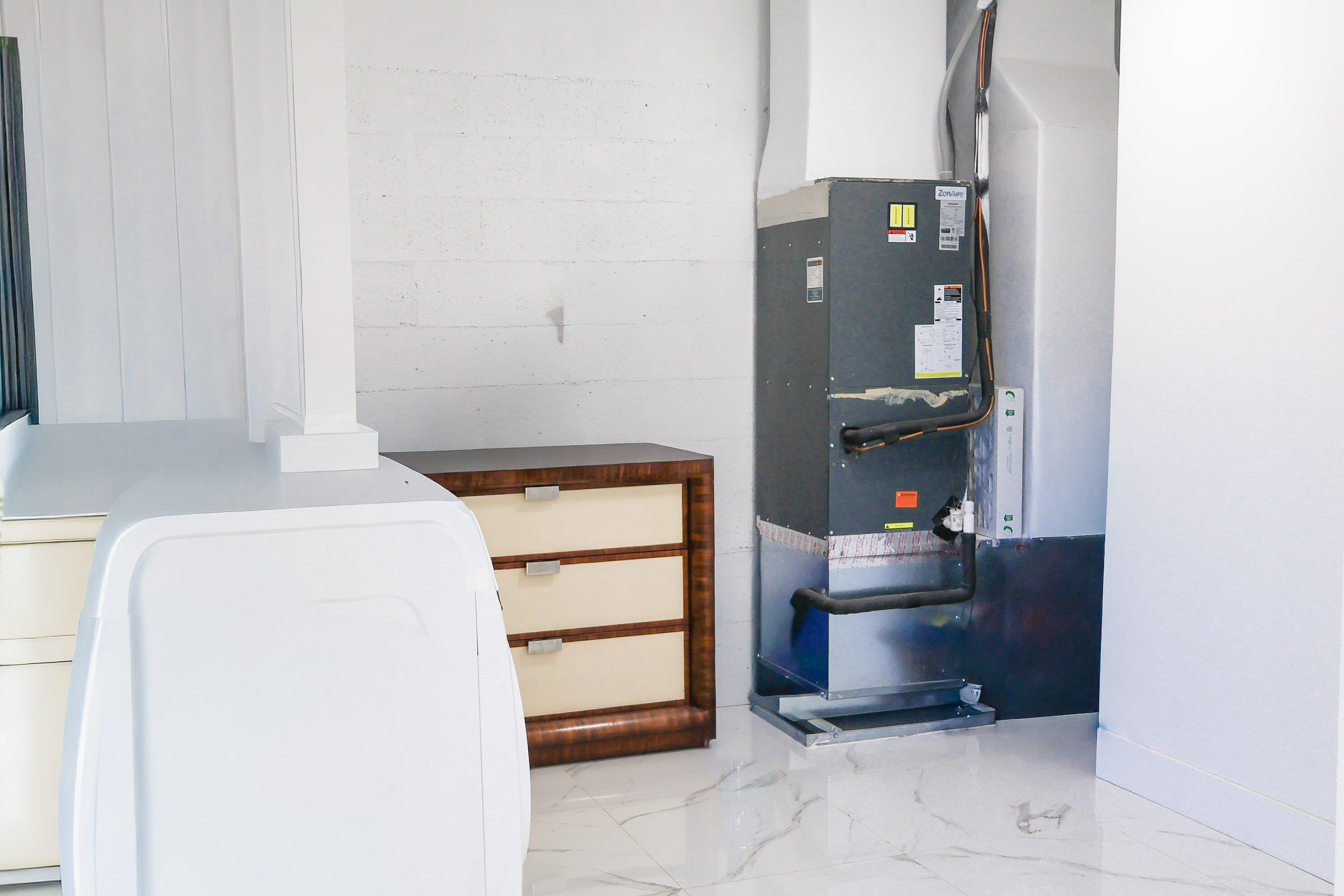 5905 Triphammer Road Lake Worth, FL 33463 - Photo 13 of 16 a room with storage and utility