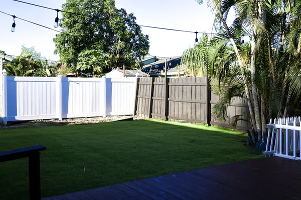 a view of a backyard with a garden