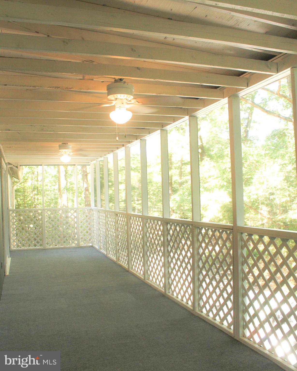 12169 Ridge Road King George, VA 22485 - Photo 30 of 37 Back Porch - Screened in with ceiling fans