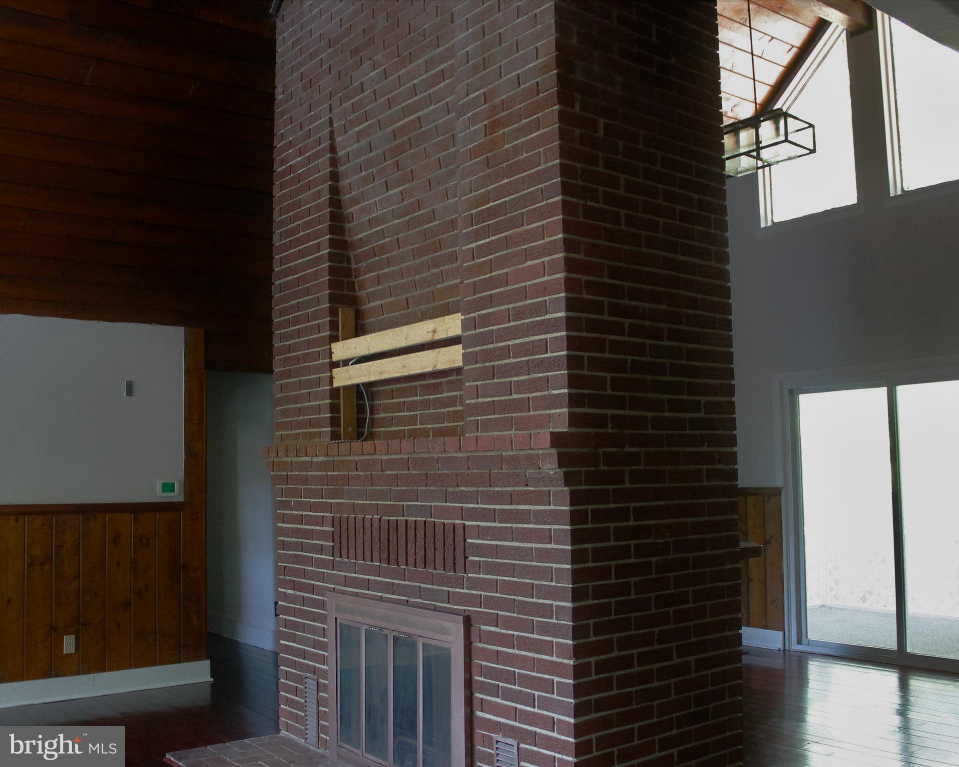 12169 Ridge Road King George, VA 22485 - Photo 9 of 37 Great Room Fireplace view -Facing Back