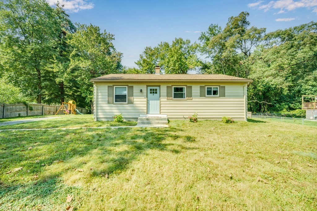 72 Wachusett Street Springfield, MA 01118 - Photo 5 of 28 a view of a house with backyard and trees
