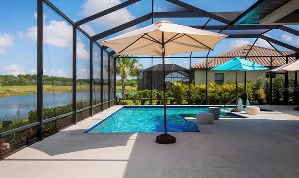 a view of yard with patio