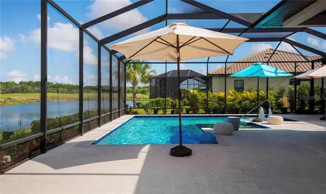 a view of yard with patio