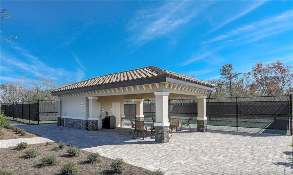 5543 Arnie Loop Bradenton, FL 34211 - Photo 14 of 45 a view of a house with a patio