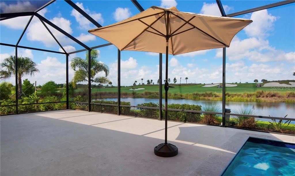 5543 Arnie Loop Bradenton, FL 34211 - Photo 3 of 45 a view of a park with a slide