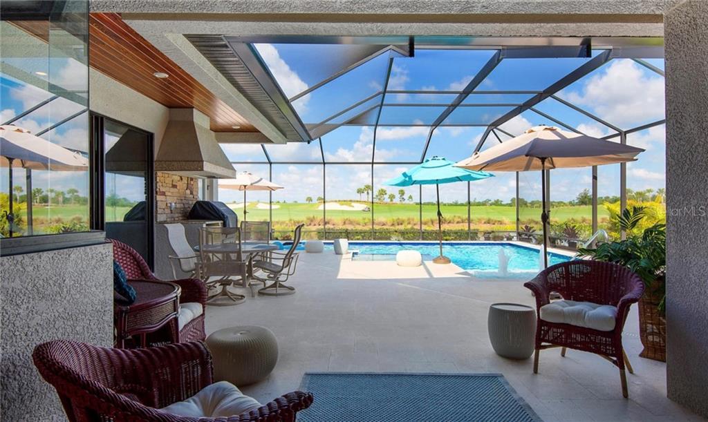 5543 Arnie Loop Bradenton, FL 34211 - Photo 9 of 45 a room with furniture and a table